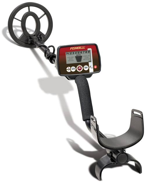 A full, angled view of the Fisher Labs F11 metal detector, showcasing its black search coil, red and black control box with a digital display, and ergonomic armrest, set against a white background.