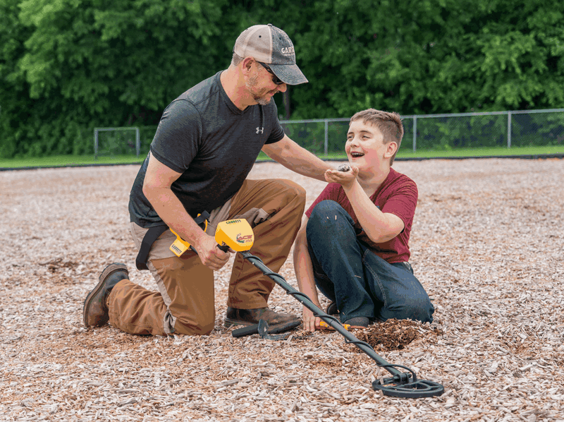 Garrett ACE 250 metal detector in use in the field