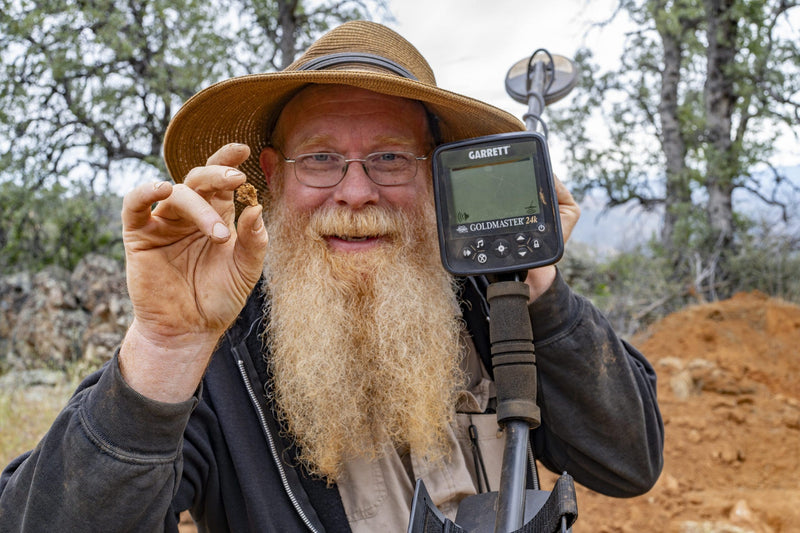 Prospector hunting gold with the Garrett Goldmaster 24K